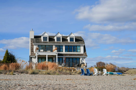 Housewarming gift ideas for a coastal home featuring ocean-inspired serving pieces and coastal decor