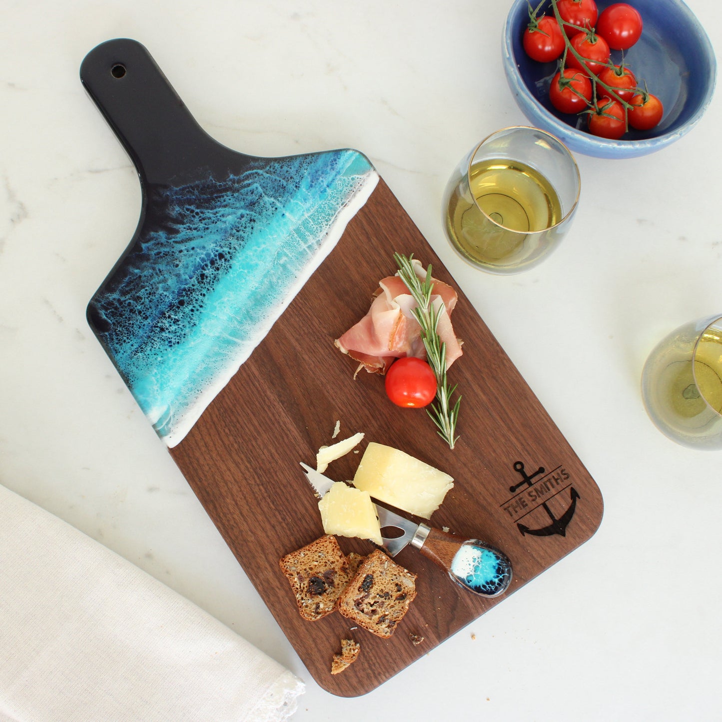 Walnut handle board with ocean resin 